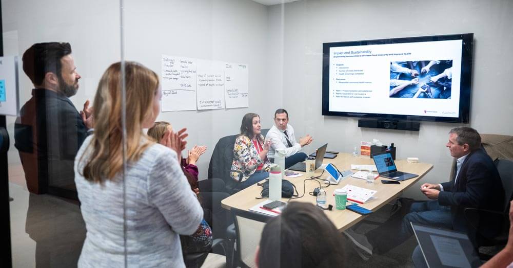 team brainstorming in conference room